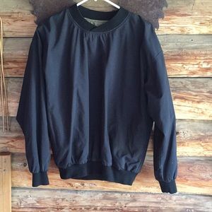 Reversible golfing windbreaker shell